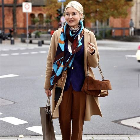 how to wear small hermes scarf|Hermes scarf street style.